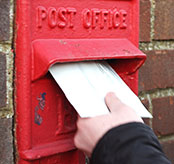 Person posting a letter